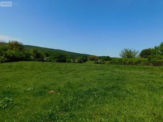 Terrain constructible à vendre 95 500 € 1 235 m² de terrain Neuville-sur-Ain 01160
