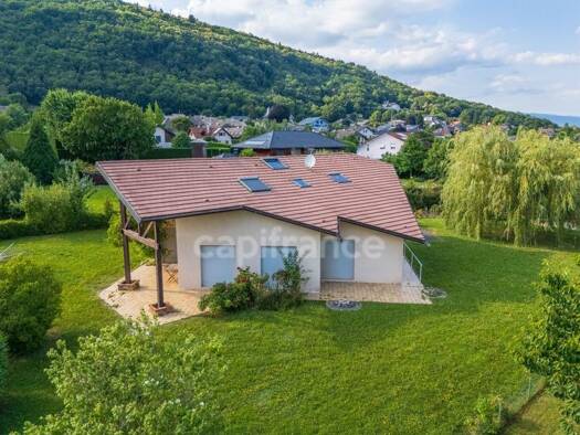 Maison à vendre 1 050 000 € 6 pièces 3 chambres 160 m² 1 345 m² de terrain Sud Ouest Divonne-les-Bains 01220