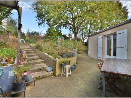 Maison de plain-pied à vendre 237 350 € 5 pièces 4 chambres 106 m² 913 m² de terrain Centre Ville-Quartiers Nord et Ouest Montaigu-Vendée 85600