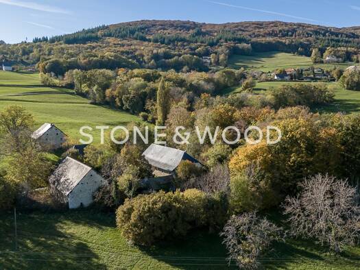 Ferme à vendre 832 000 € 10 pièces 4 chambres 571 m² 22 360 m² de terrain Saint-Ours 73410