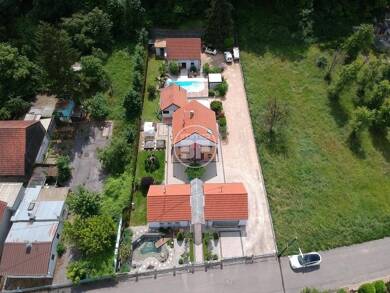 Maison à vendre 659 000 € 7 pièces 4 chambres 196 m² 1 565 m² de terrain Bartenheim 68870