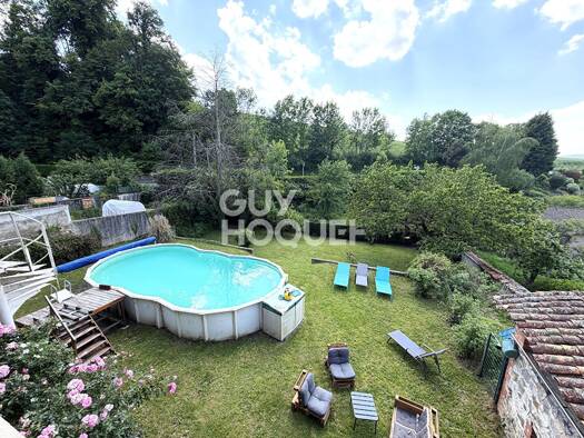 Maison à vendre 299 000 € 7 pièces 4 chambres 158 m² 870 m² de terrain Saint-Genis-l'Argentière 69610
