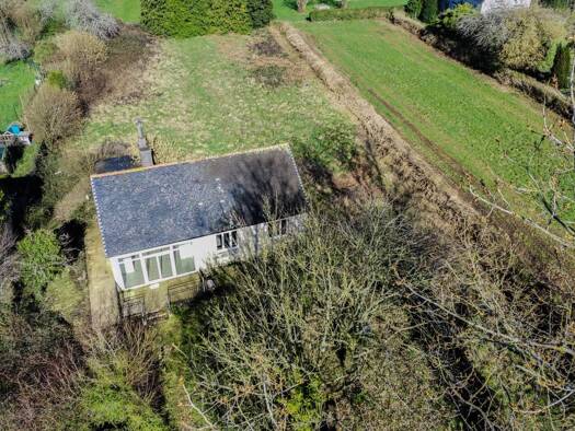 Maison de plain-pied à vendre 87 000 € 3 pièces 2 chambres 70 m² 2 100 m² de terrain Plouyé 29690