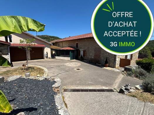 Maison de plain-pied à vendre 319 000 € 5 pièces 2 chambres 113,4 m² 1 860 m² de terrain Saint-Martin-du-Mont 01160