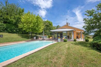 Maison de plain-pied à vendre 650 000 € 7 pièces 4 chambres 175 m² 2 000 m² de terrain Villefranche sur Saone 69400