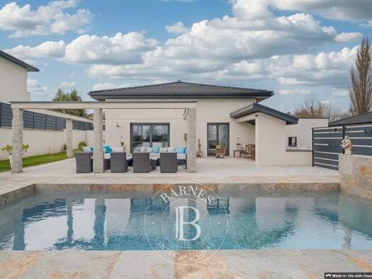 Maison de plain-pied à vendre 629 000 € 6 pièces 3 chambres 139 m² 850 m² de terrain Sérézin-de-la-Tour 38300