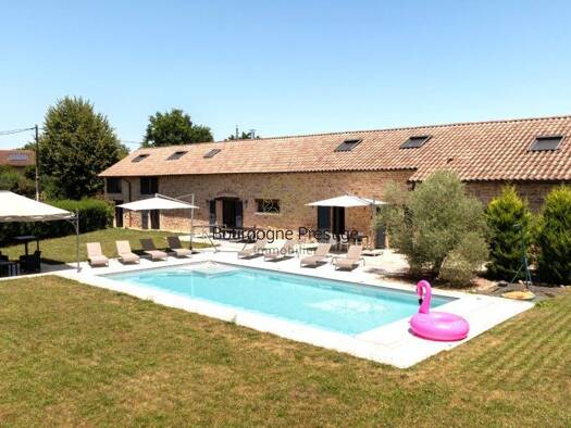 Hôtel particulier à vendre 845 000 € 8 pièces 6 chambres 338 m² 3 108 m² de terrain Centre Ville Tournus 71700